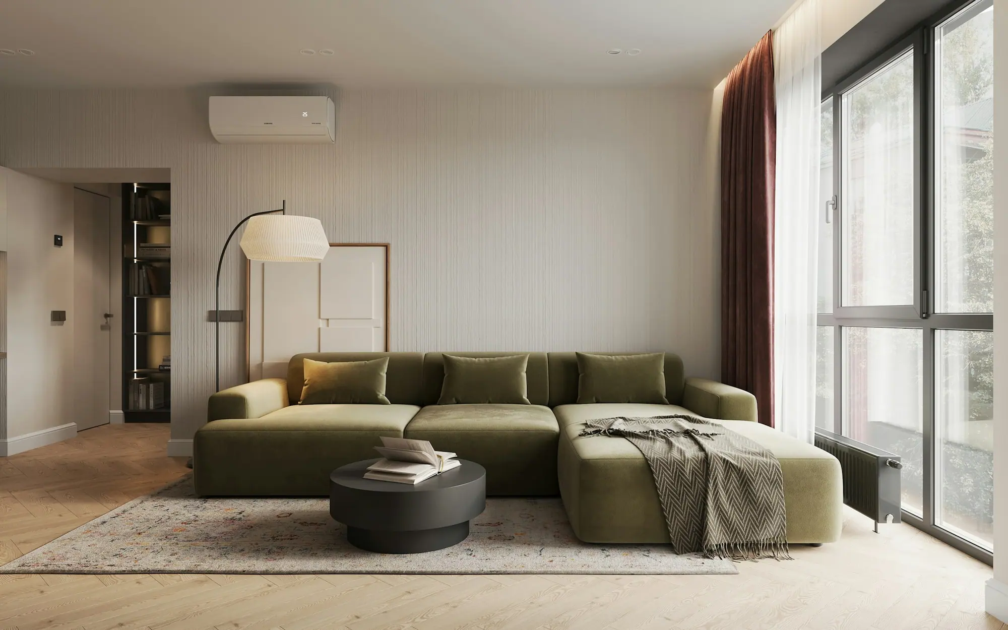 Stijlvol vakantieappartement met een groene bank in warme, neutrale tinten